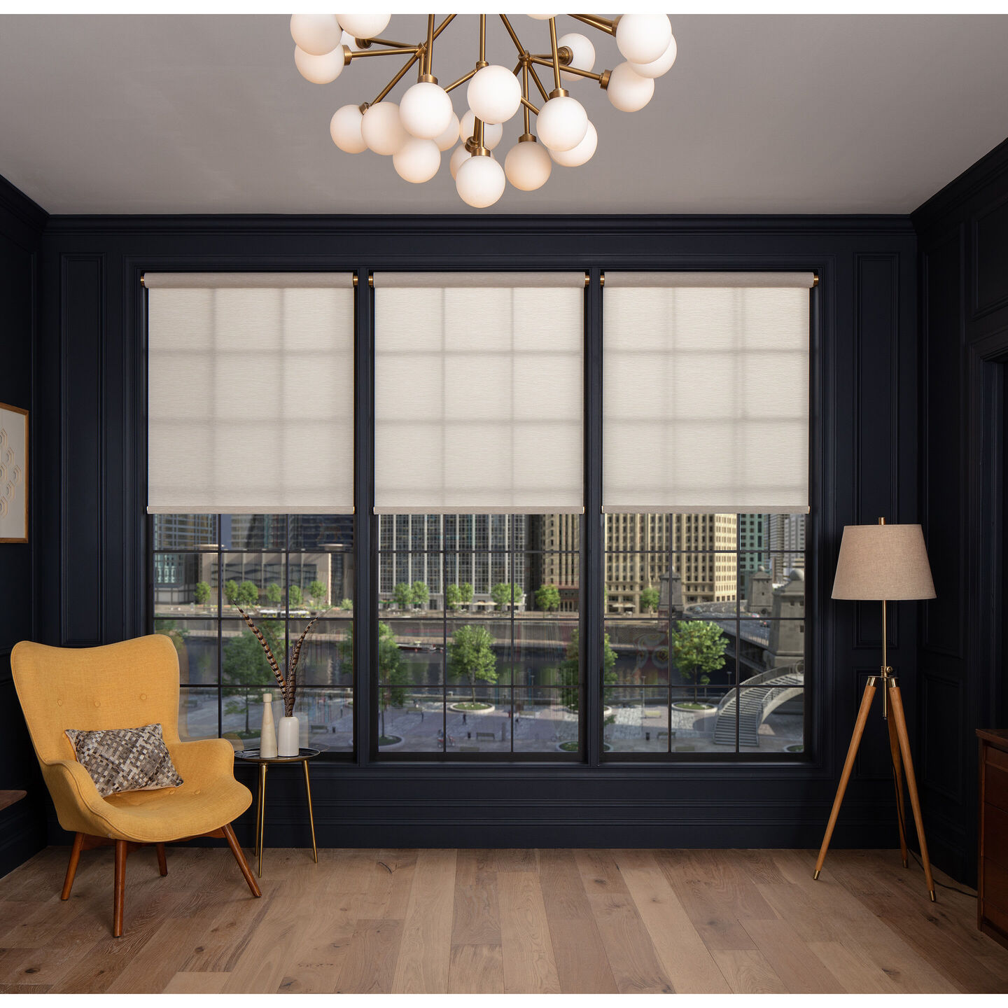 Lutron Palladiom motorized shades framing a wide waterfront and skyline view.