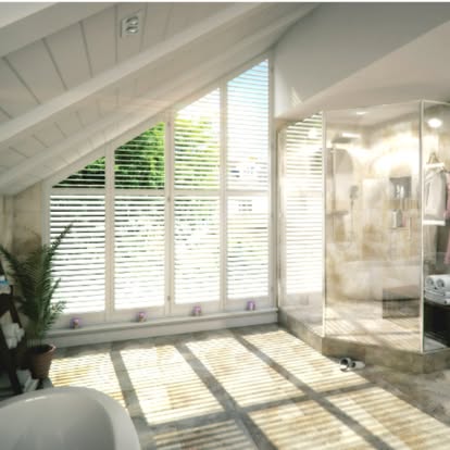 Plantation shutters custom-fit to angled vaulted windows in a sunlit stone bathroom