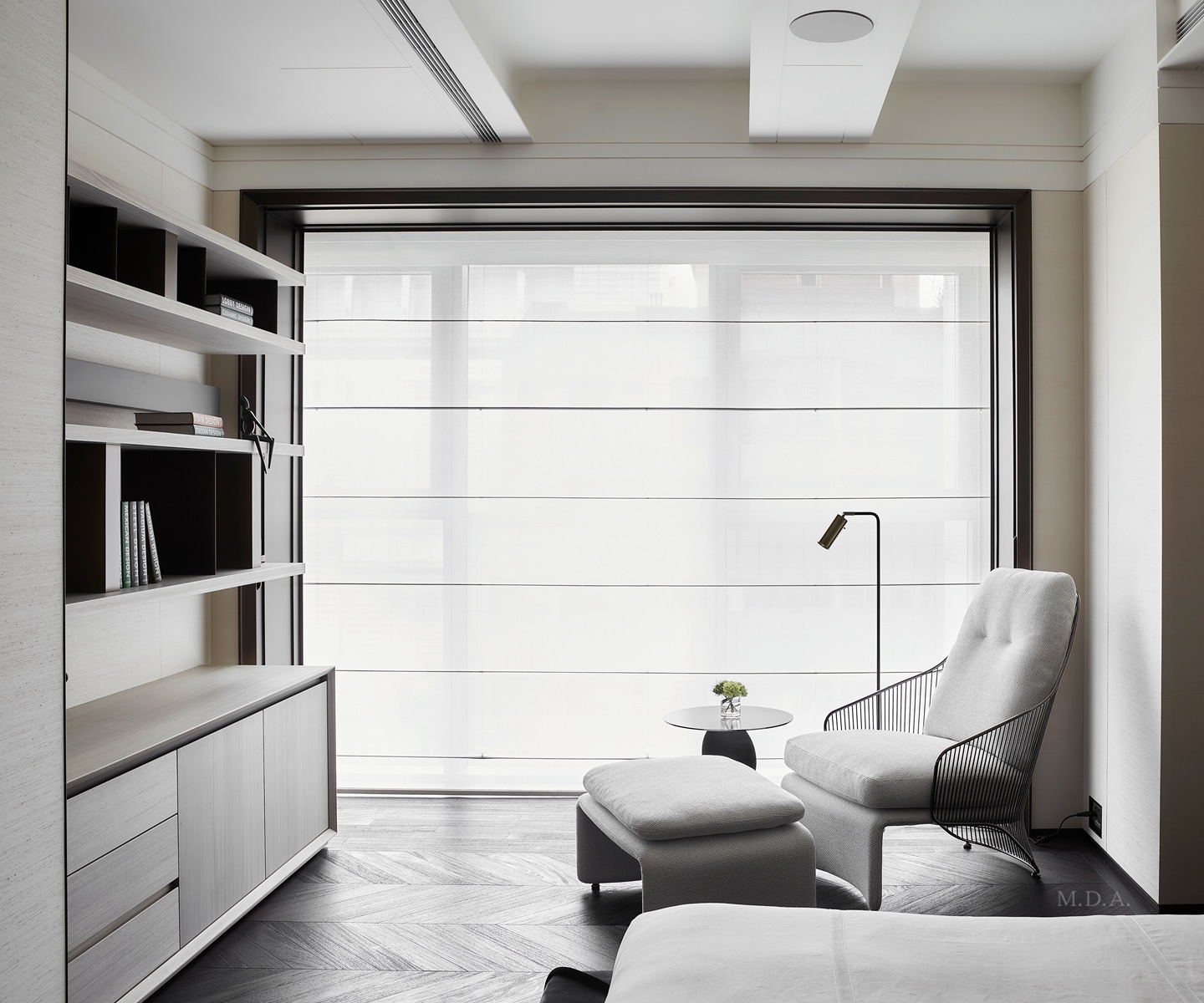 Sheer banded Centerpiece Roman shade filling a floor-to-ceiling window in a minimalist living room