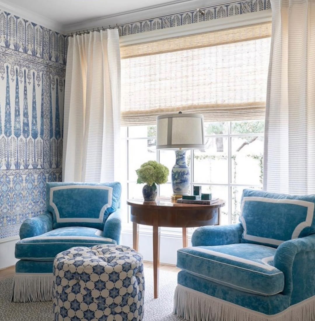 Apartment community model unit with clean, uniform shades and a bright living space