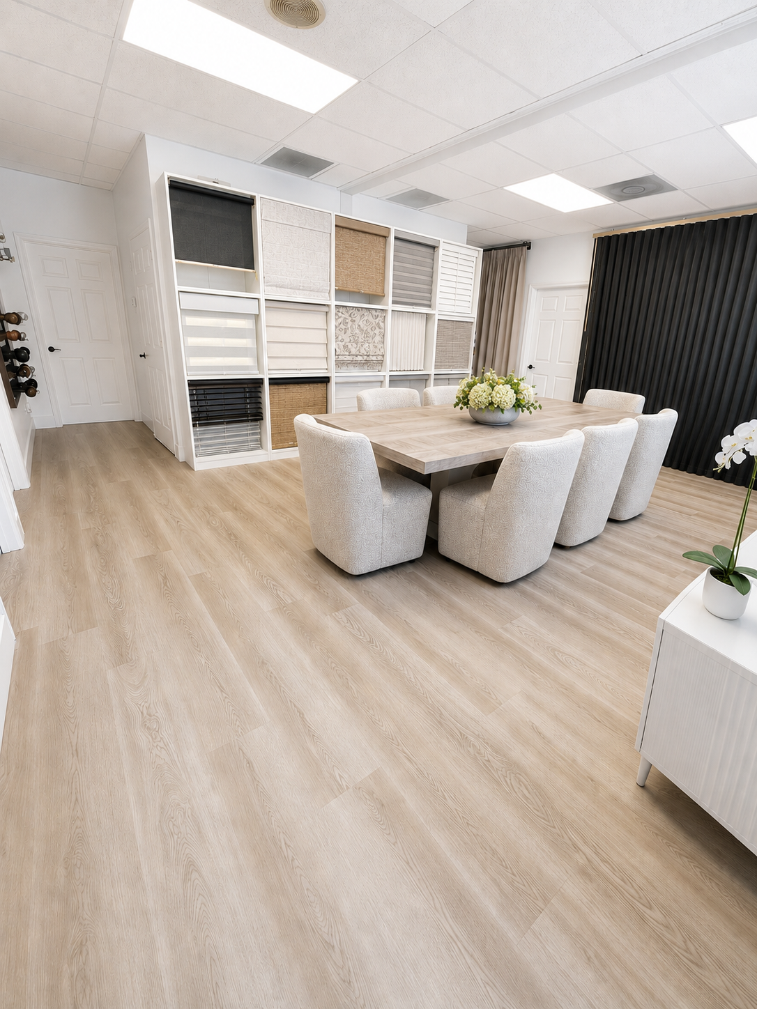 A range of window treatments displayed in a bright Sarasota showroom-style living space